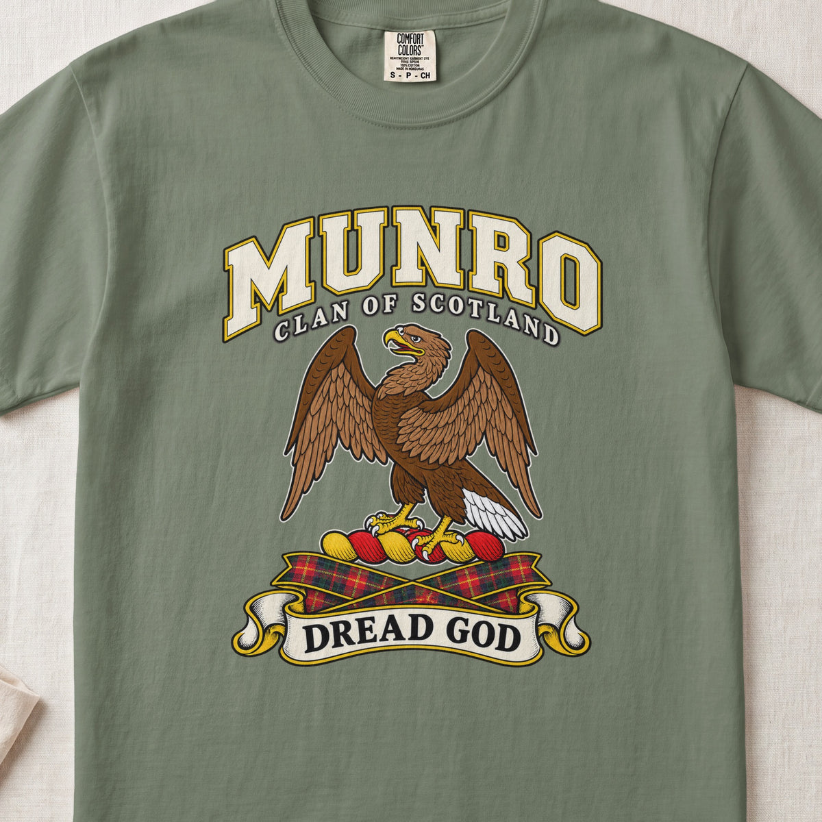 Munro Scottish clan T-shirt in Moss, front view with a brown eagle with spread wings and motto banner.