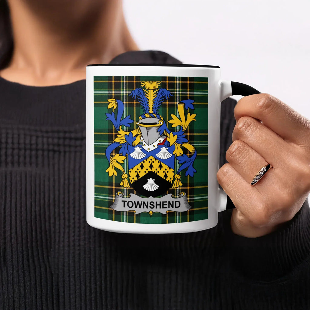 Mug with Townshend family crest on a green plaid background.