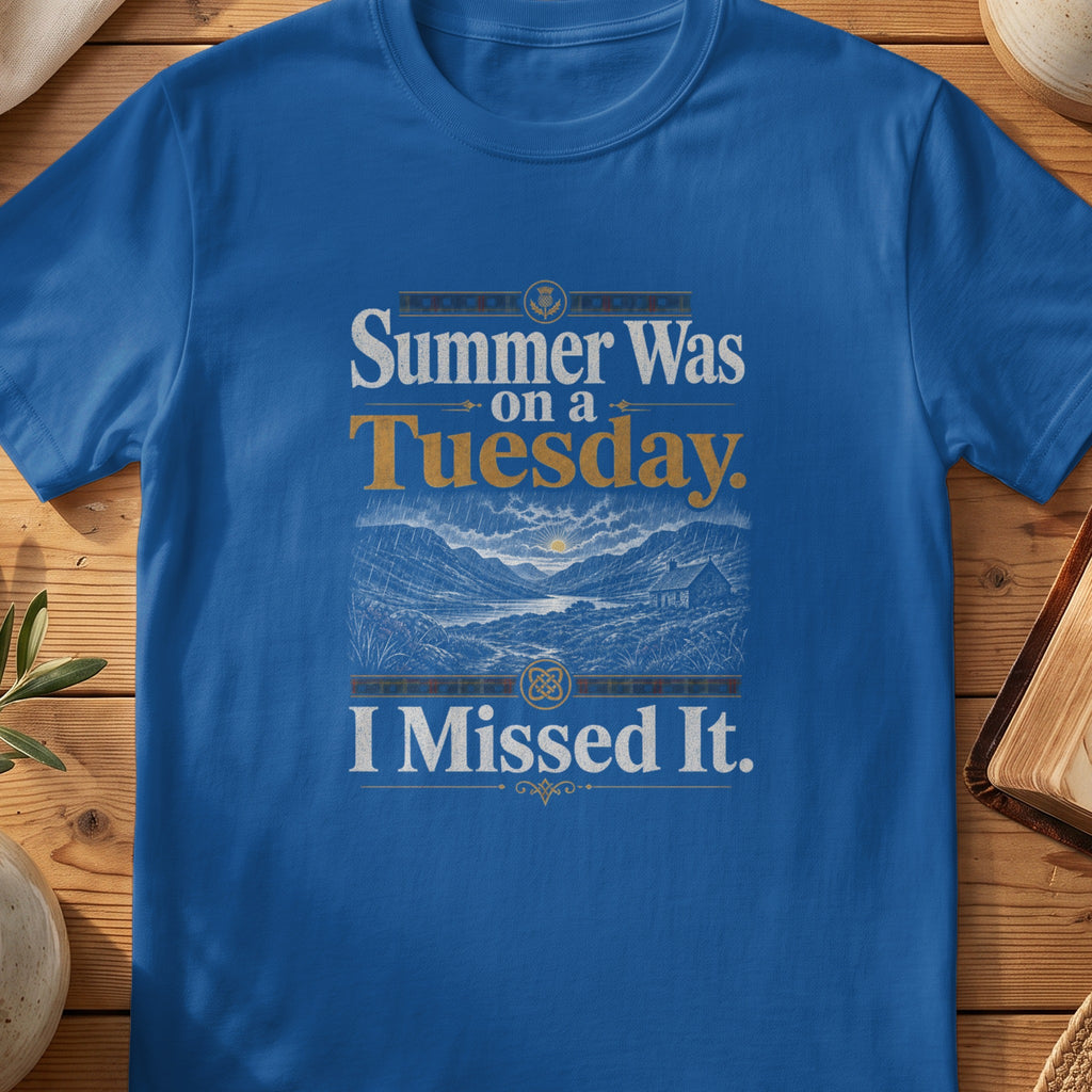 Blue t-shirt with text "Summer Was on a Tuesday. I Missed It." and a landscape graphic.