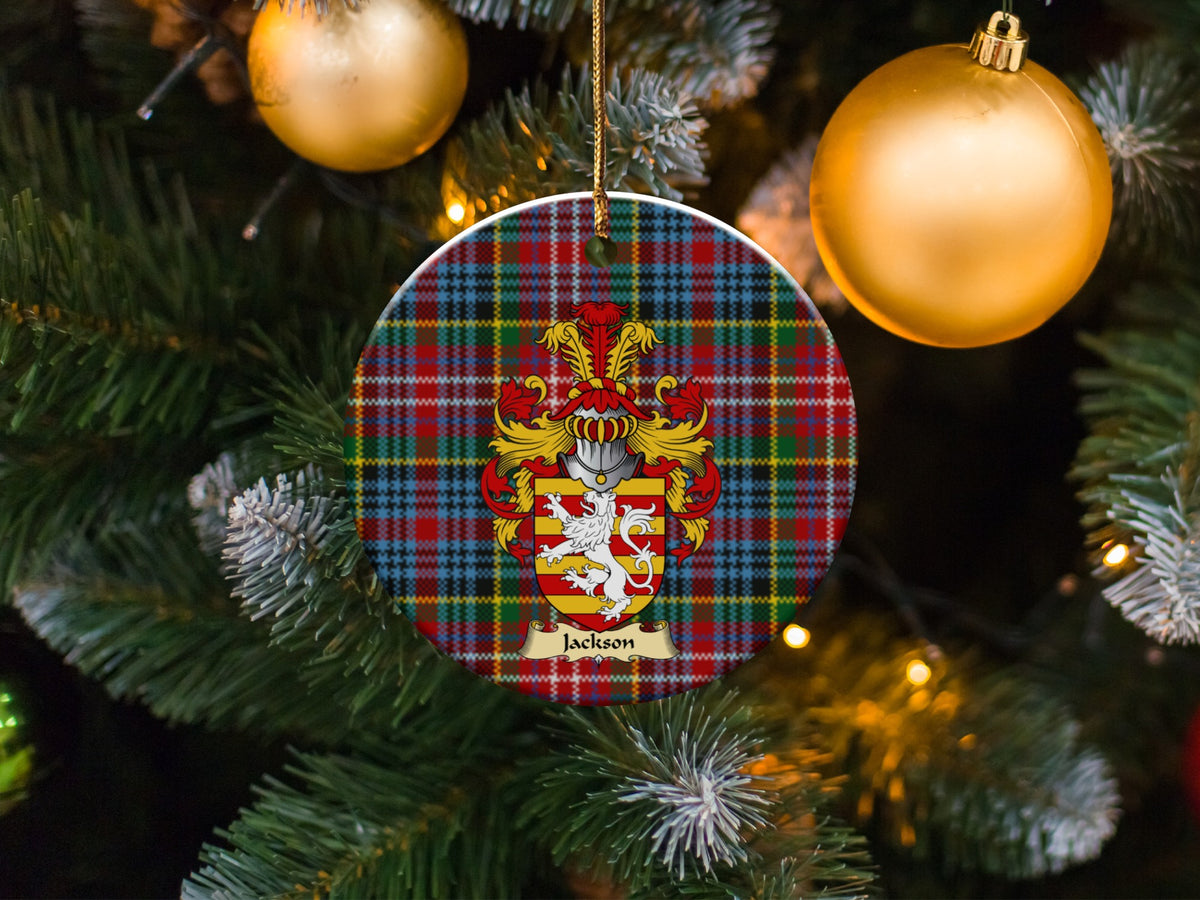 Jackson family emblem ceramic Christmas ornament with Caledonia tartan background in festive holiday décor