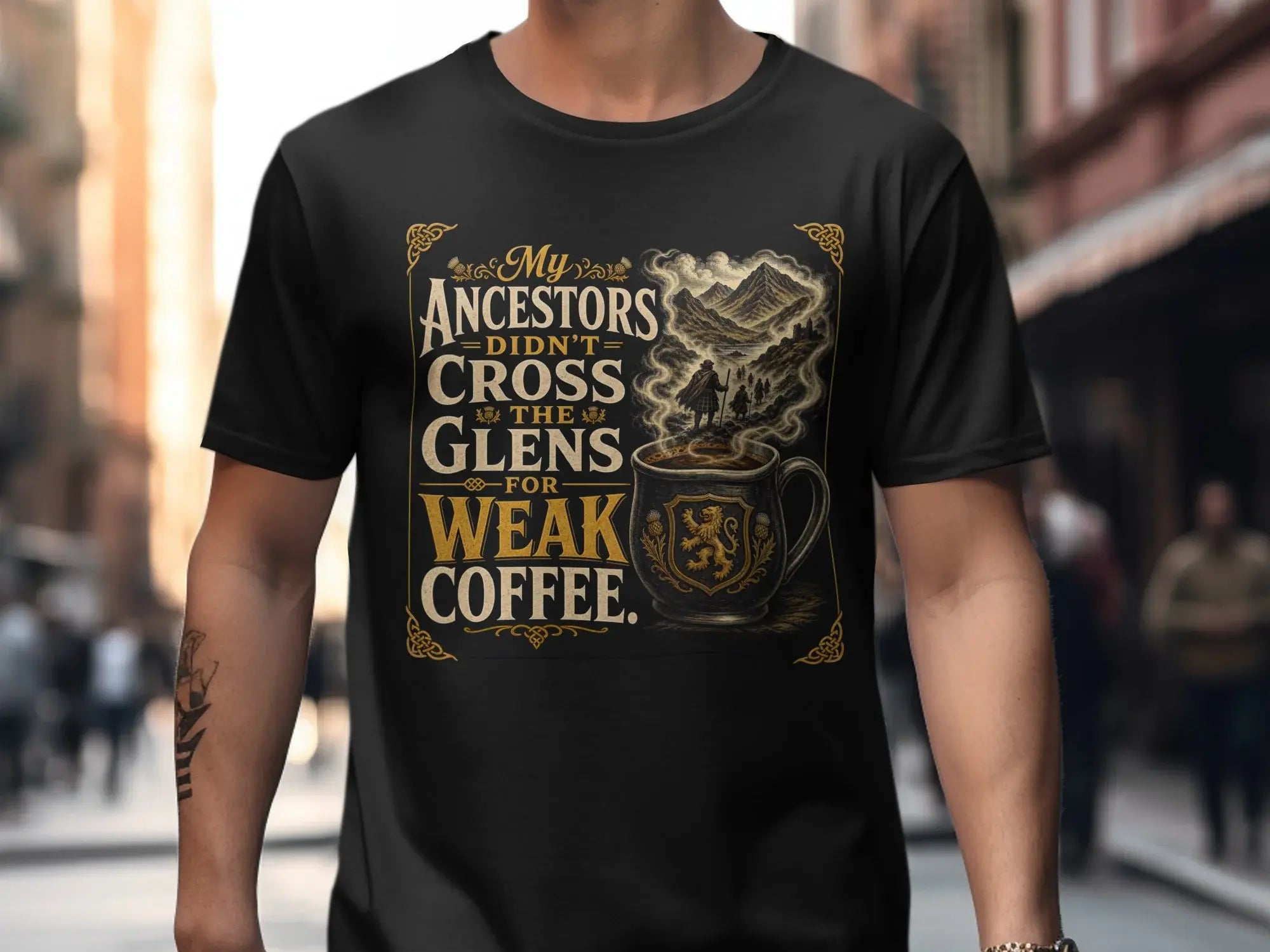 T-shirt with "My Ancestors Didn't Cross the Glens for Weak Coffee" and a coffee cup emblem.