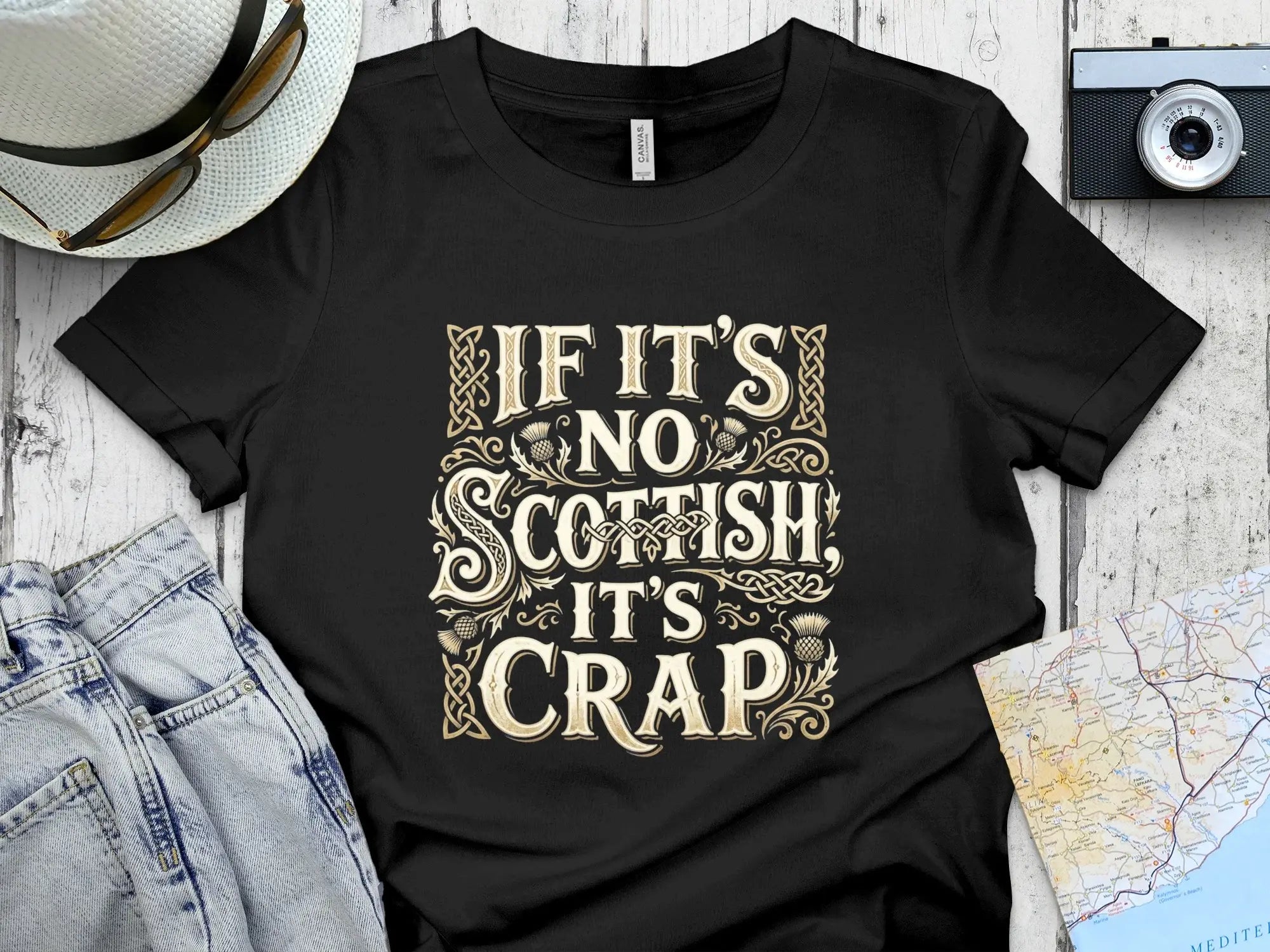 Black t-shirt with "IF IT'S NO SCOTTISH IT'S CRAP" text and Scottish designs.