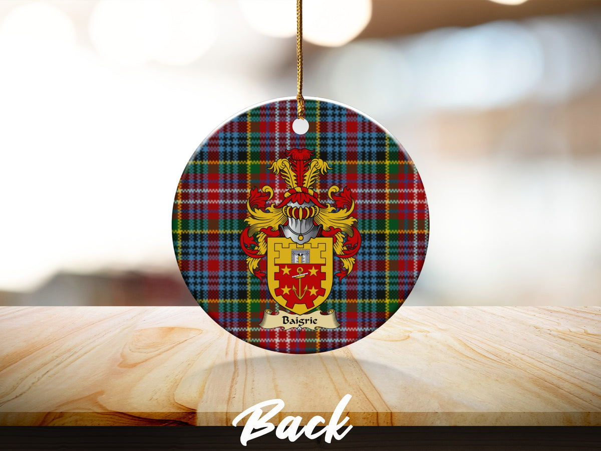 Round Baigrie Scottish clan ornament with family crest on a Caledonia tartan background