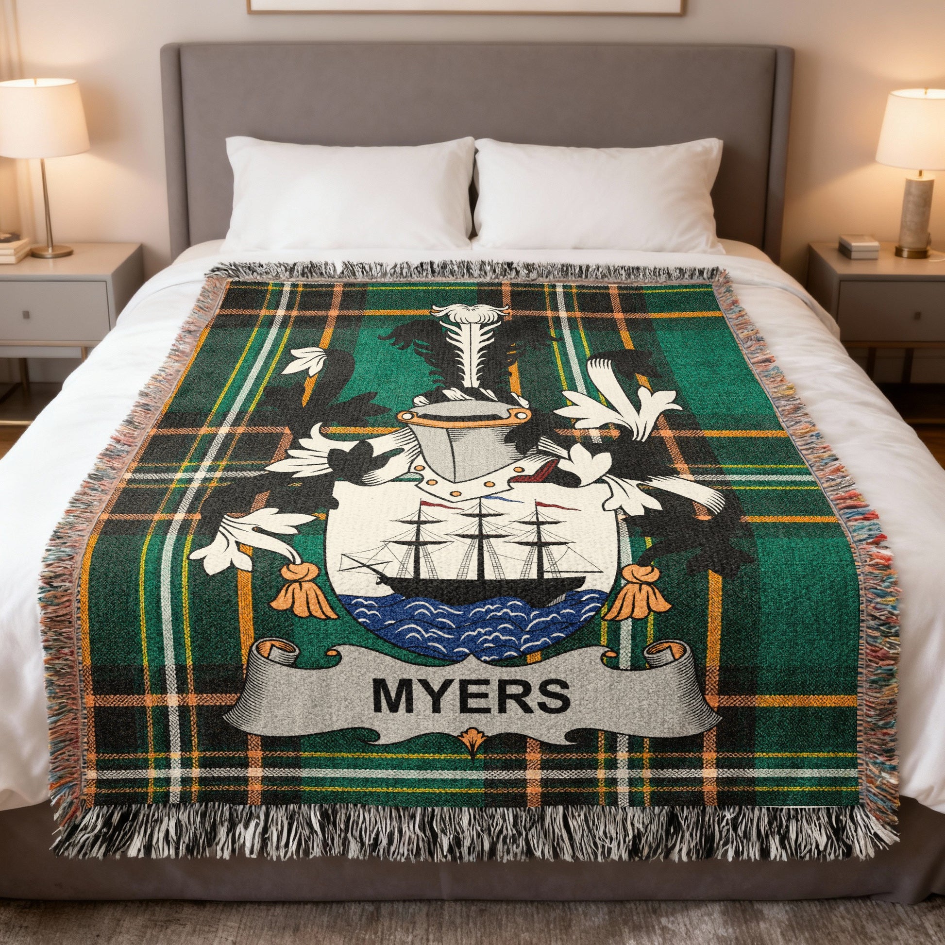 Tartan blanket with Myers family crest featuring a ship and shield.