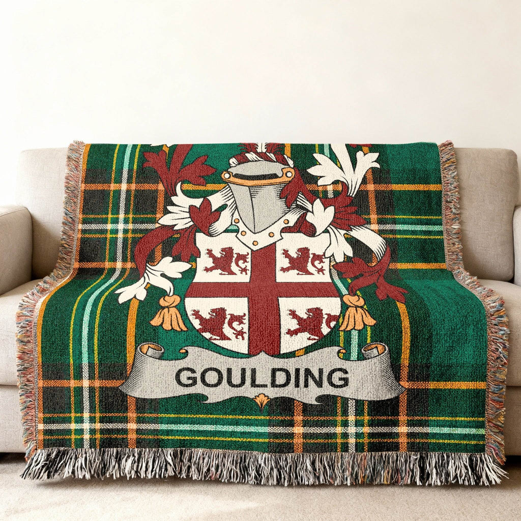 Goulding family crest on a green tartan woven blanket.
