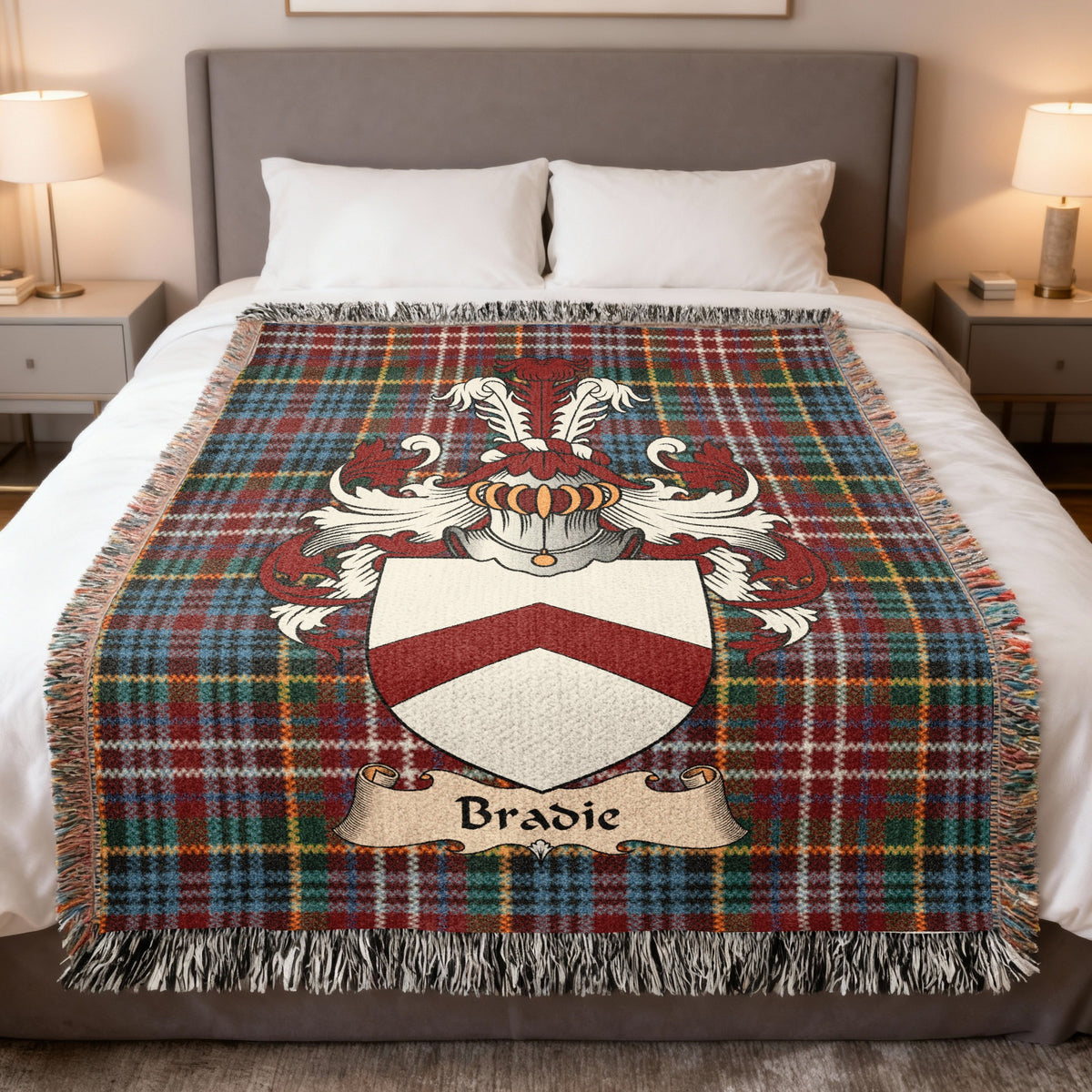 Bradie family crest emblem on a Caledonia tartan woven blanket