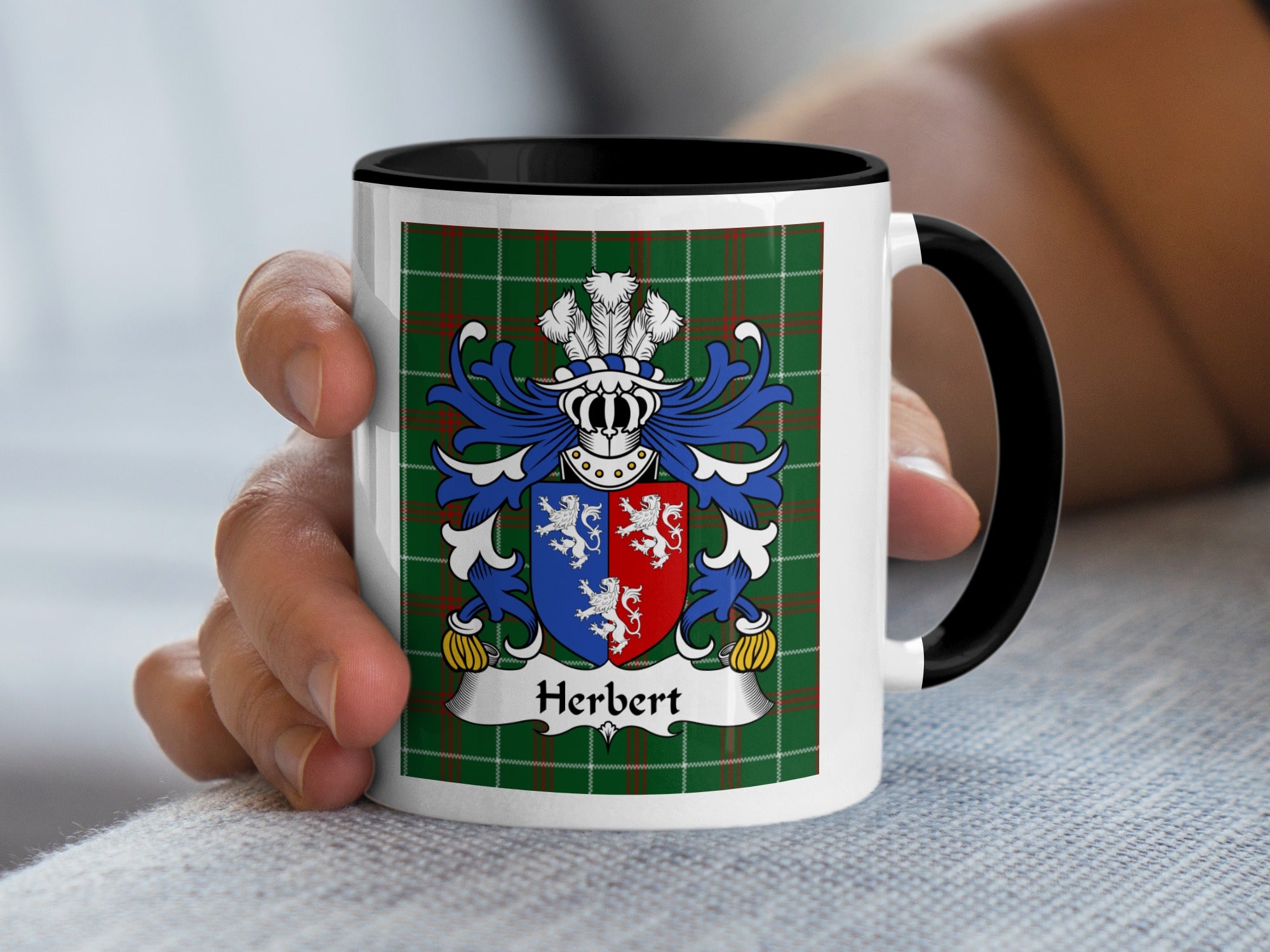 Mug with Herbert family crest on a green tartan background.