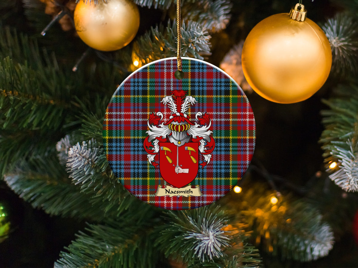 Naesmith family emblem ceramic Christmas ornament with Caledonia tartan background in festive holiday décor