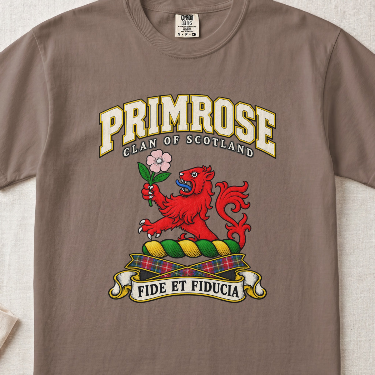 Primrose Scottish clan T-shirt in Espresso, front view with a red lion holding a pink flower and motto design.
