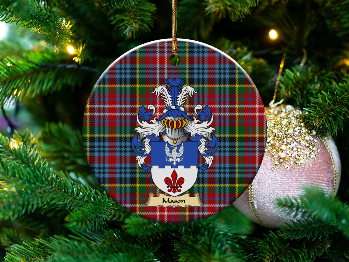 Mason Scottish clan ceramic ornament with family crest on a Caledonia tartan background, hanging on a Christmas tree