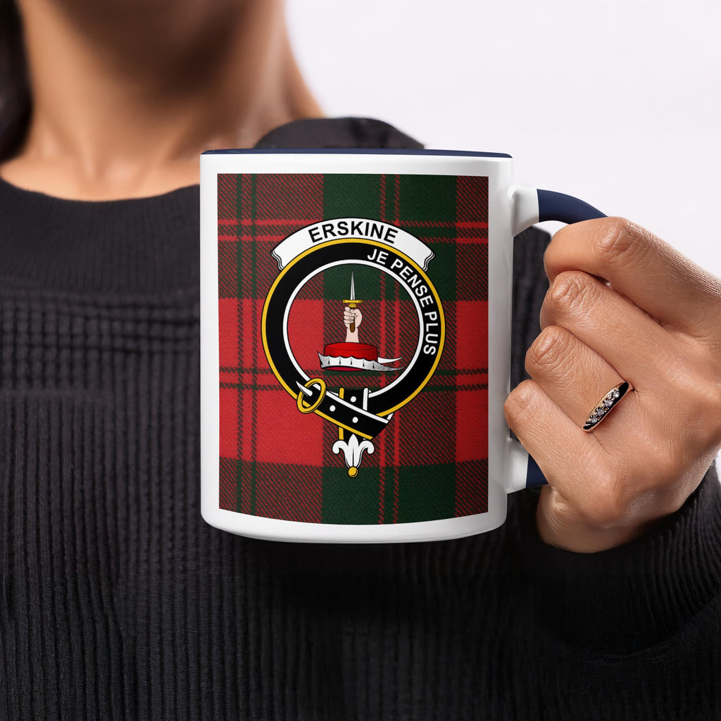 Close-up lifestyle view of Erskine Scottish clan crest artwork on a navy 11 oz accent mug with a tartan background