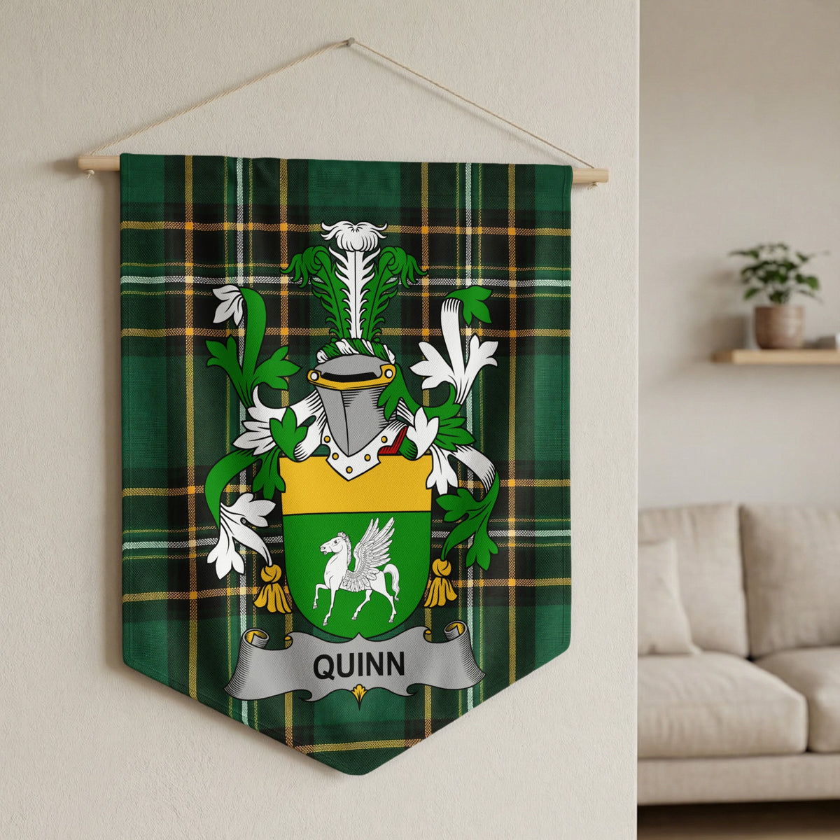 Quinn family crest banner on a green plaid background, featuring a pegasus.