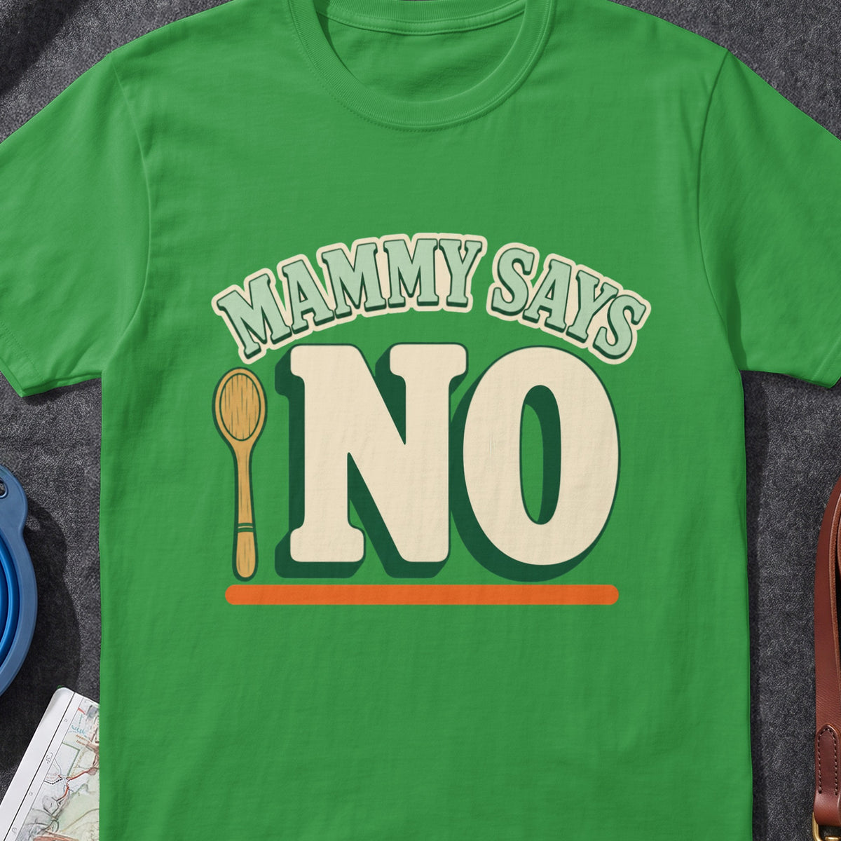 Mammy Says No Wooden Spoon funny Irish T-shirt in Irish Green, flat-lay mockup