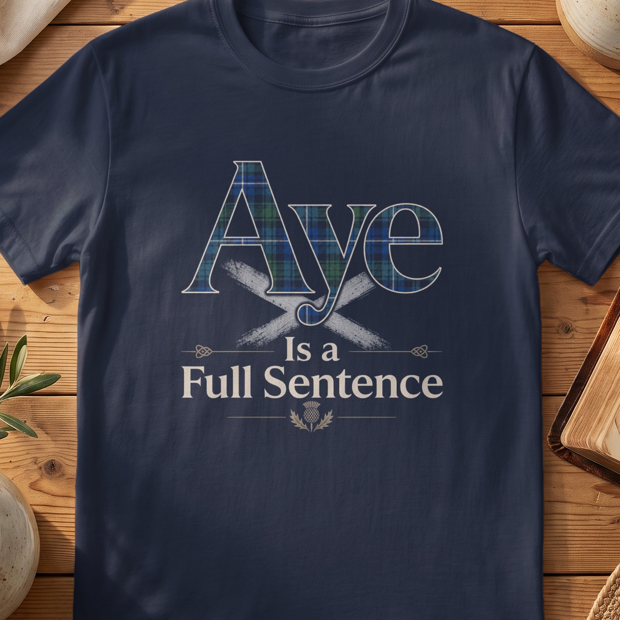Navy Gildan 64000 unisex T-shirt flatlay with Aye Is a Full Sentence Scottish graphic design