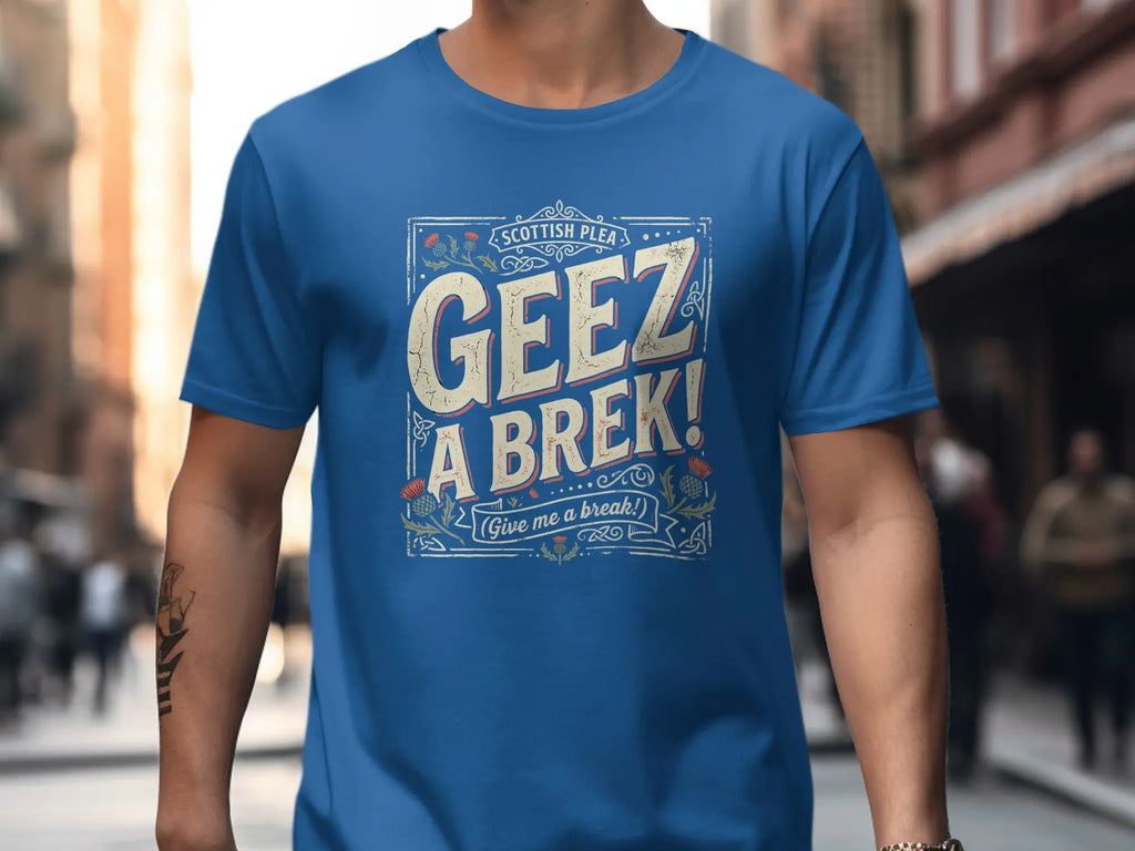 Blue t-shirt with "Geez A Brek!" and Scottish thistles.