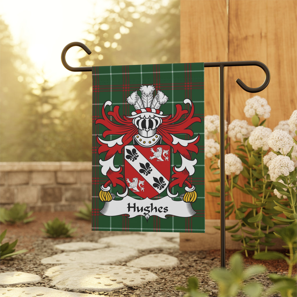 Hughes family crest on a green tartan garden flag.