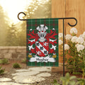 Hughes family crest on a green tartan garden flag.