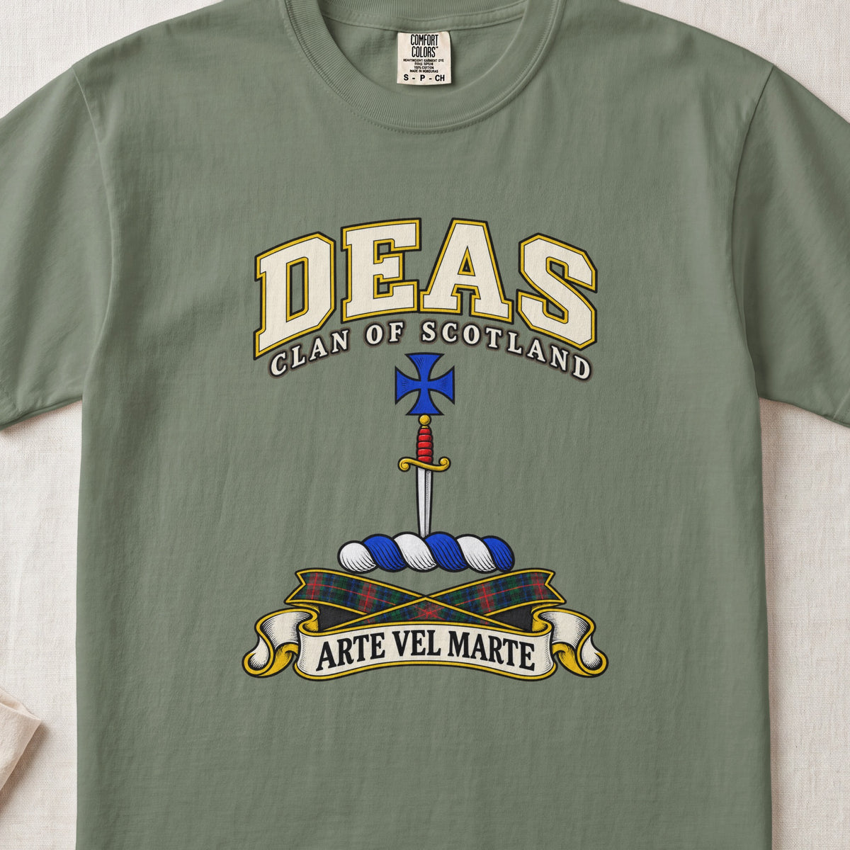 Deas Scottish clan T-shirt in Moss, front view with a vertical dagger and blue cross and motto design.