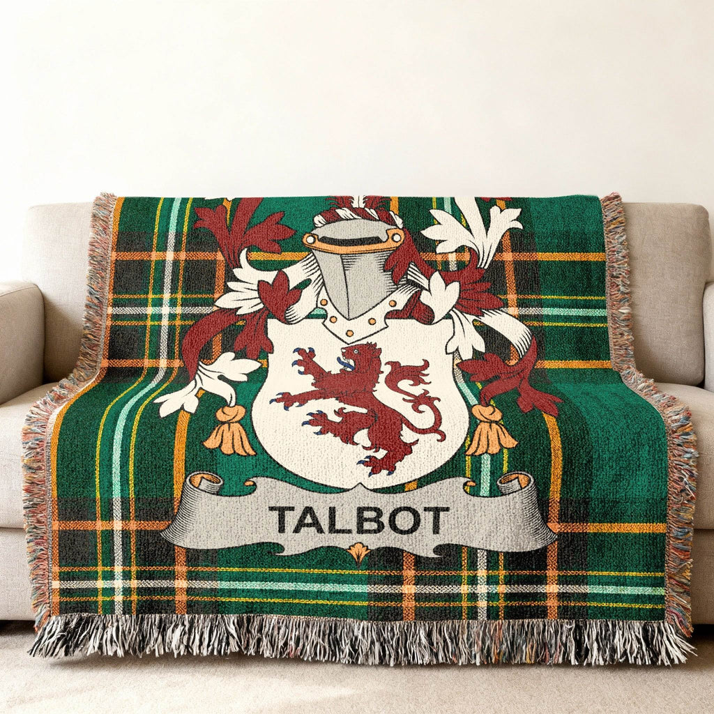 Talbot family crest on green plaid woven throw blanket.