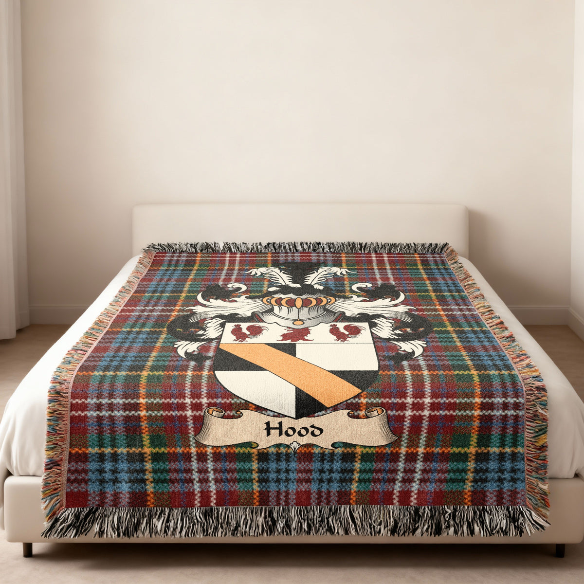 Hood Scottish family shield woven blanket on a Caledonia tartan background