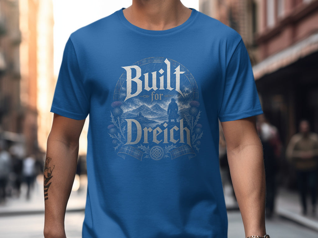 Blue t-shirt with "Built for Dreich" text and Scottish thistle design.