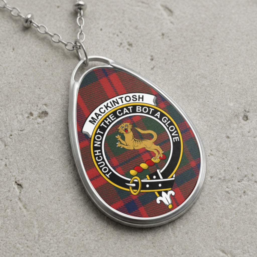 Oval pendant necklace with Mackintosh tartan and motto "Touch Not The Cat A Glove".
