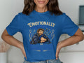 Blue t-shirt with a bearded man hugging bagpipes and the text "Emotionally by Bagpipes".