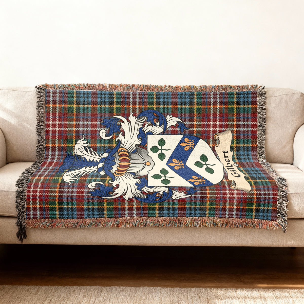 Gilbert Scottish woven blanket with family shield and Caledonia tartan background