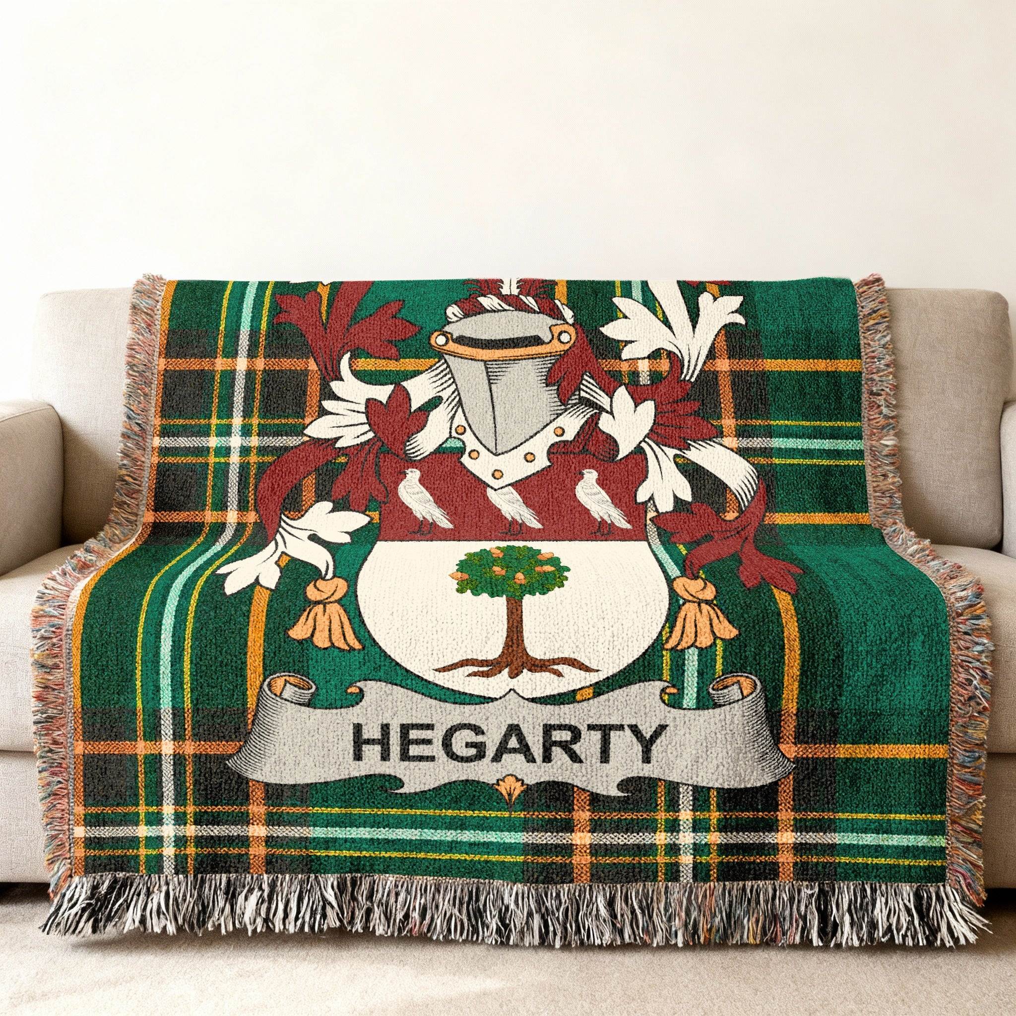 Hegarty family crest on a green plaid woven throw blanket.