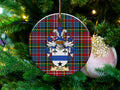 Sharp Scottish clan ceramic ornament with family crest on a Caledonia tartan background, hanging on a Christmas tree