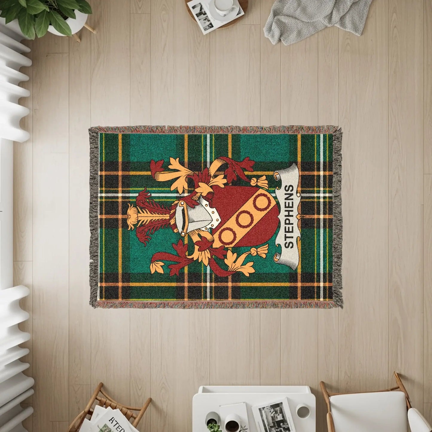 Tapestry with green plaid and a coat of arms for the surname Stephens.