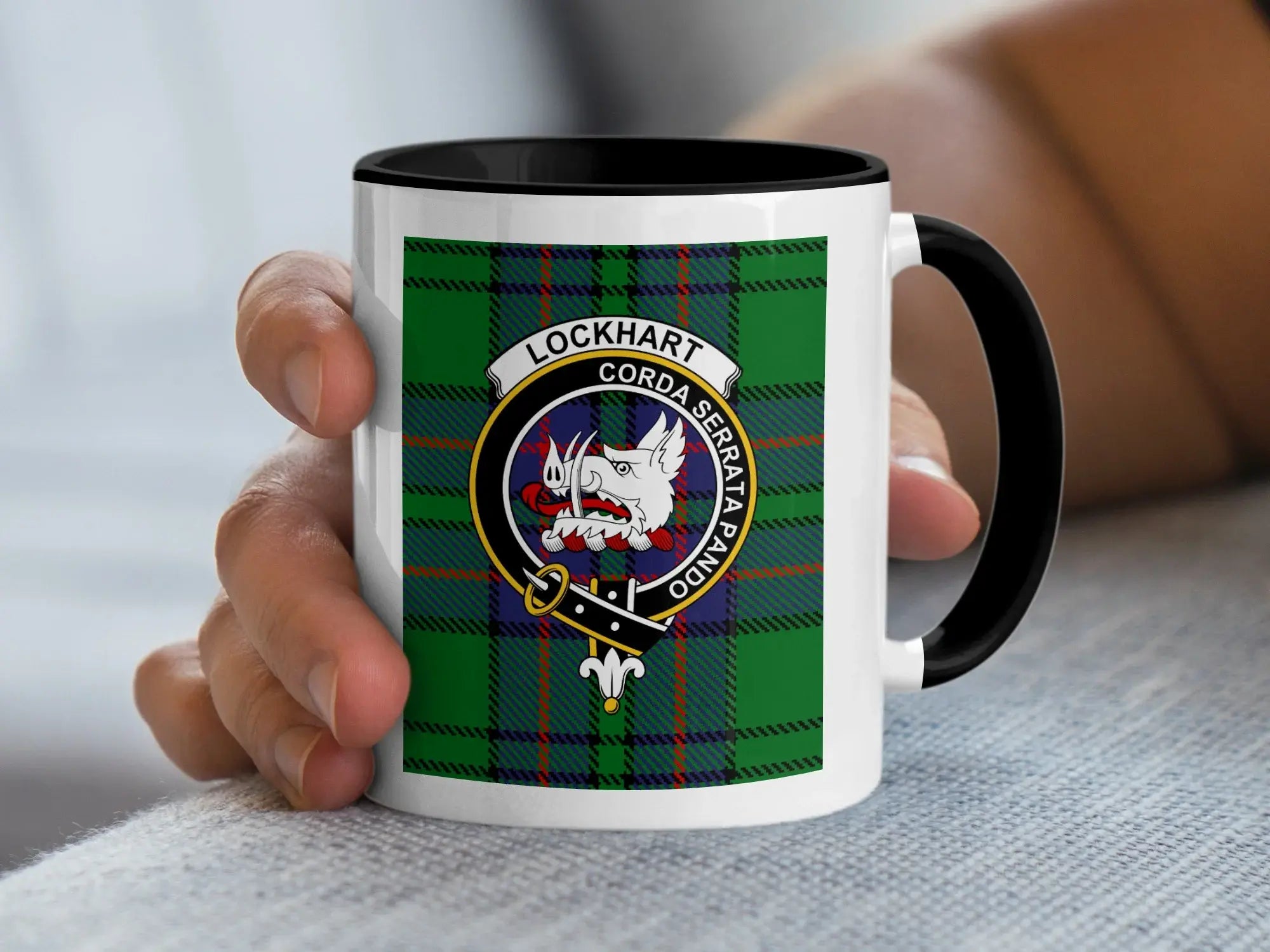 Clan Lockhart crest mug — navy handle, 11 oz ceramic with tartan and boar's head crest print