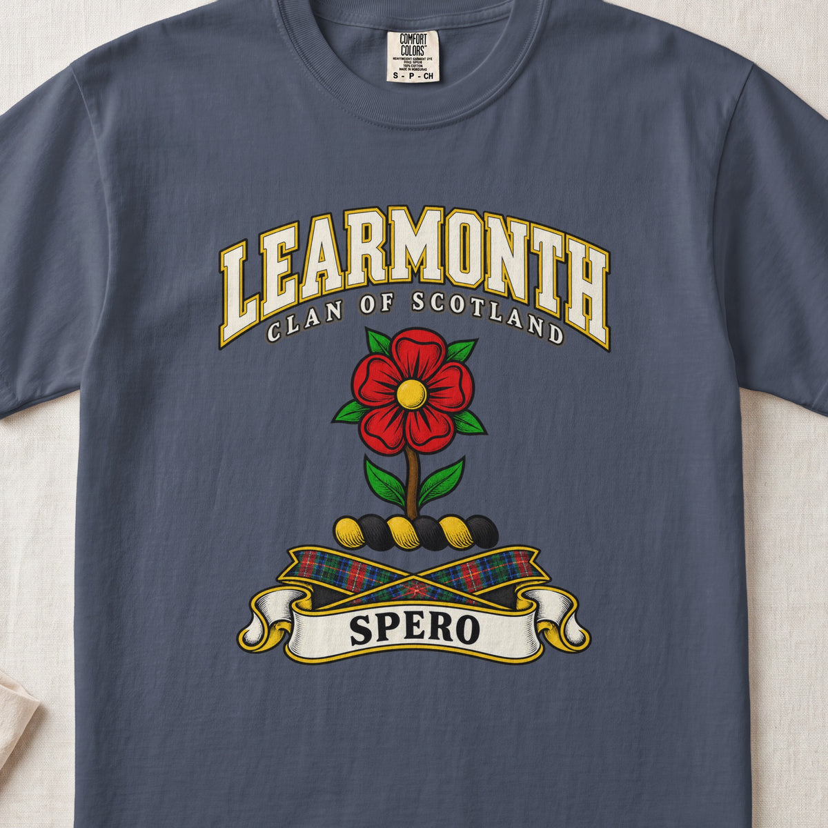 Learmonth Scottish clan T-shirt in Midnight, front view with a red rose with green leaves and motto design.