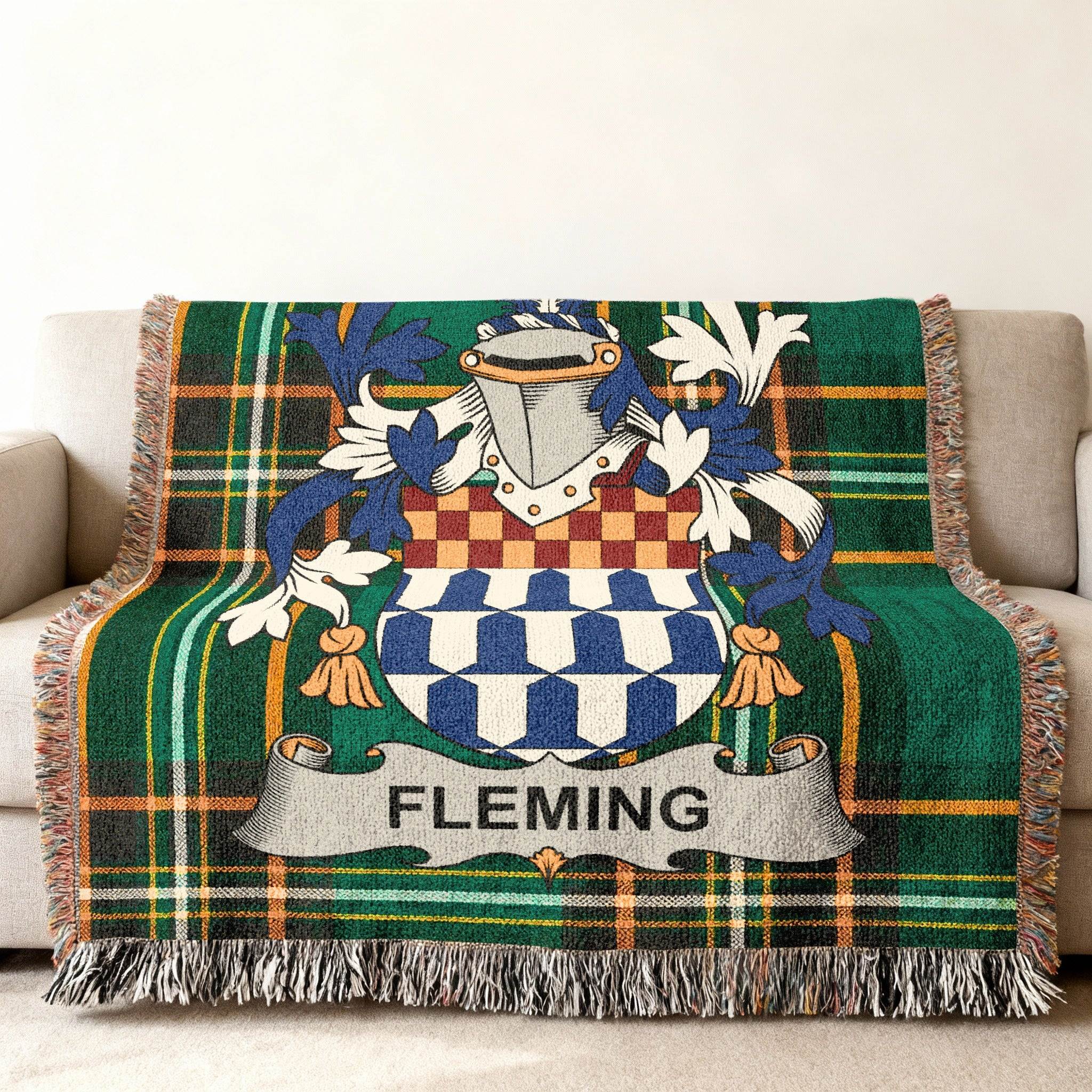 Green plaid throw blanket with Fleming family crest.