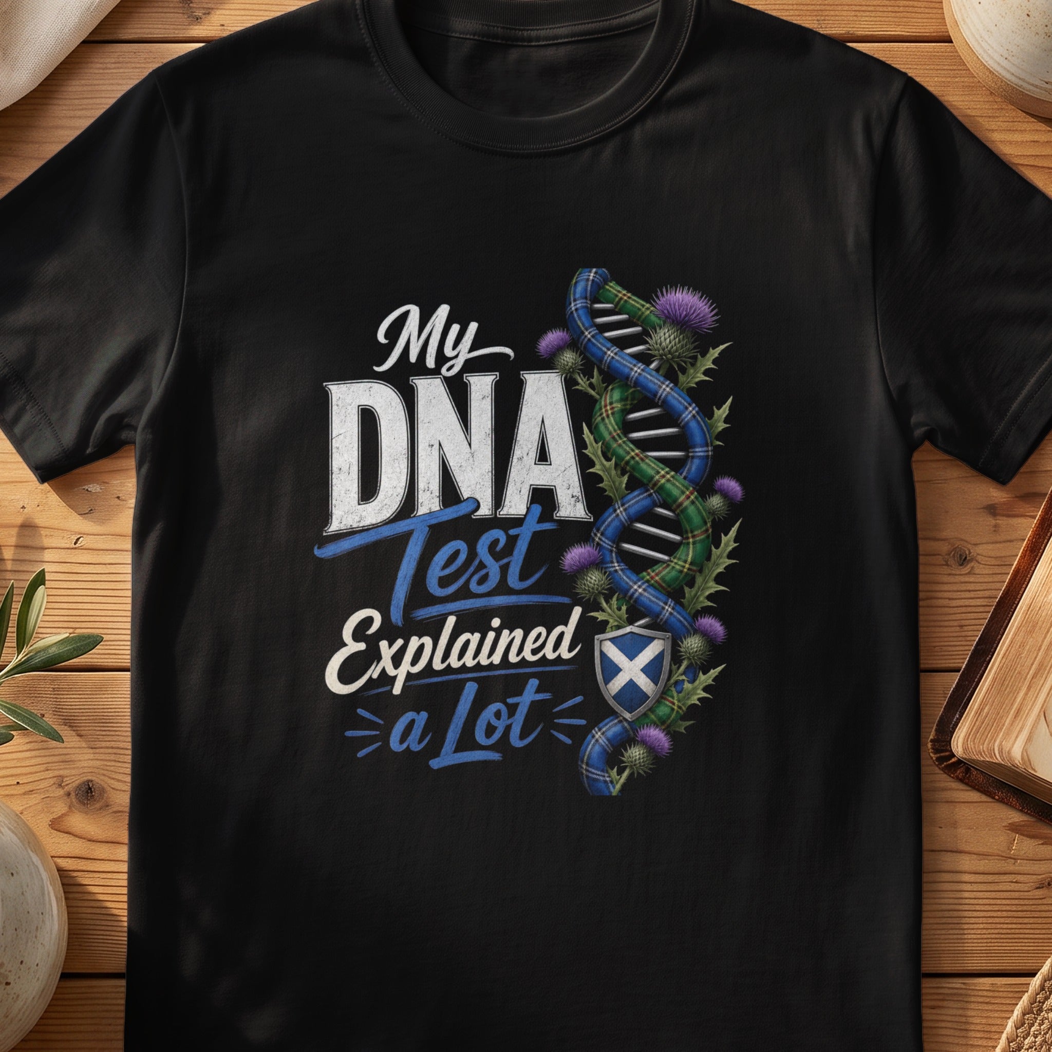 Black Gildan 64000 unisex T-shirt flatlay with My DNA Test Explained a Lot Scottish graphic design