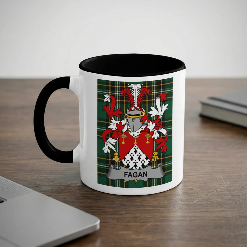 White mug with black rim featuring a Fagan family crest on a tartan background.