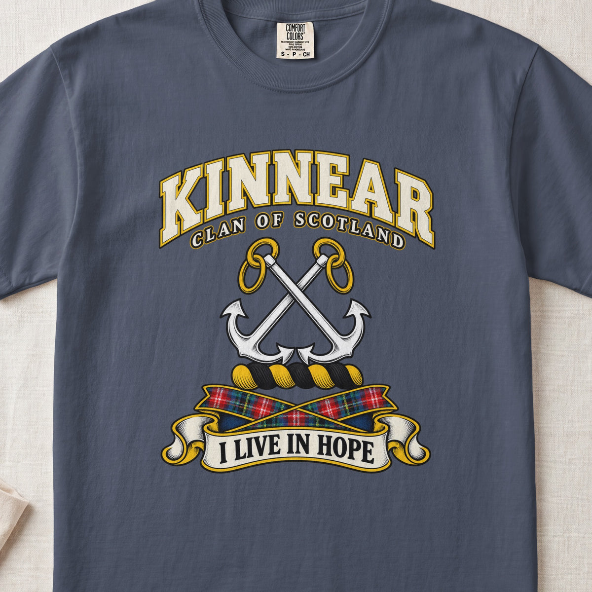 Kinnear Scottish clan T-shirt in Midnight, front view with crossed silver anchors and motto design.
