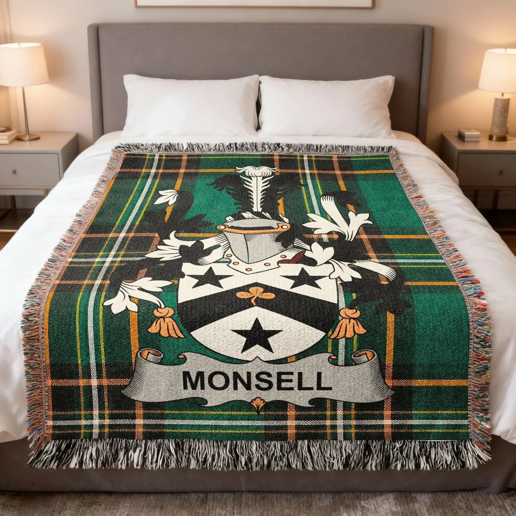 Monsell family crest on a green plaid woven throw blanket.