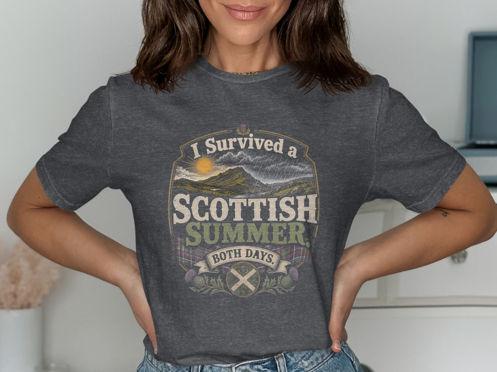 Dark gray t-shirt with "I Survived a Scottish Summer. Both Days." text and Scottish imagery.