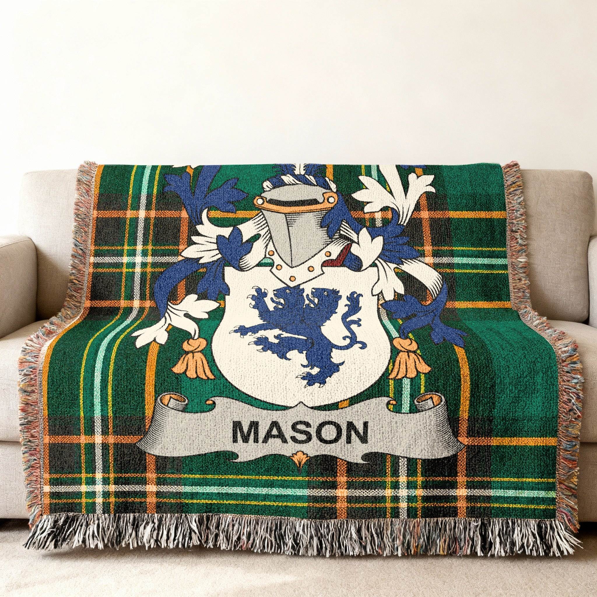Woven tartan throw blanket with Mason family crest.