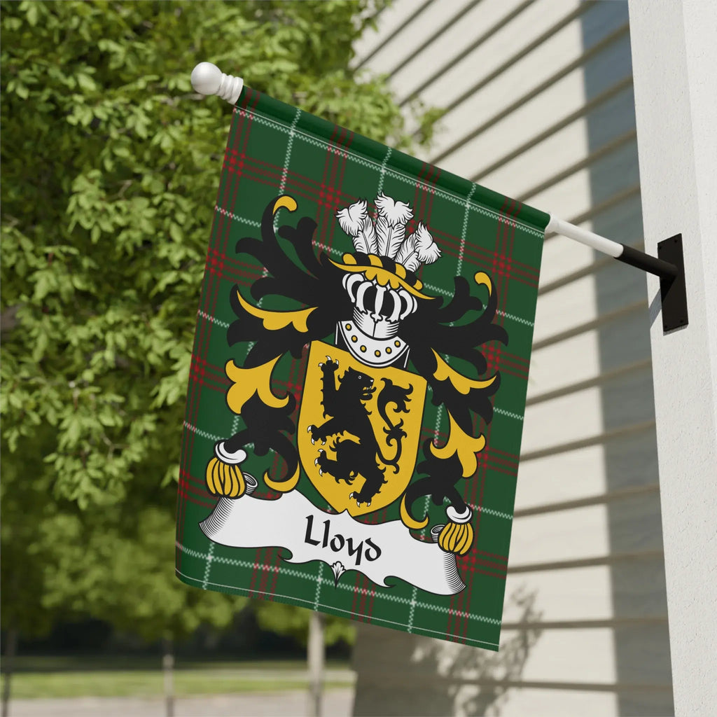Green plaid flag with black and yellow coat of arms bearing the name "Lloyd".