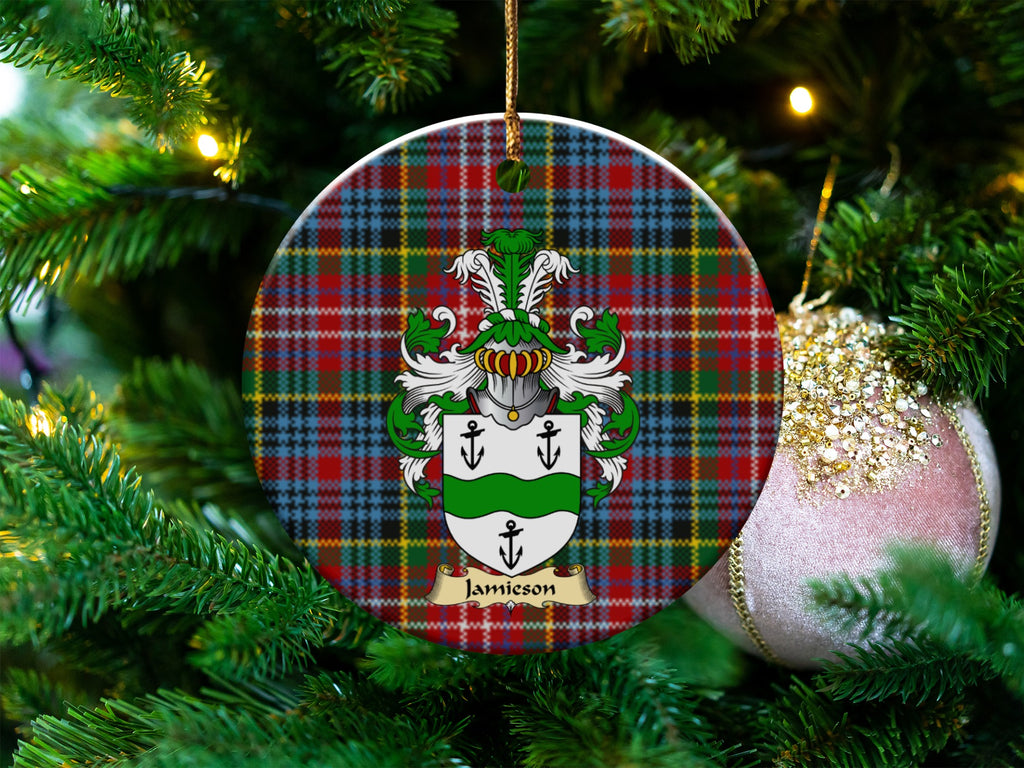 Jamieson Scottish clan ceramic ornament with family crest on a Caledonia tartan background, hanging on a Christmas tree