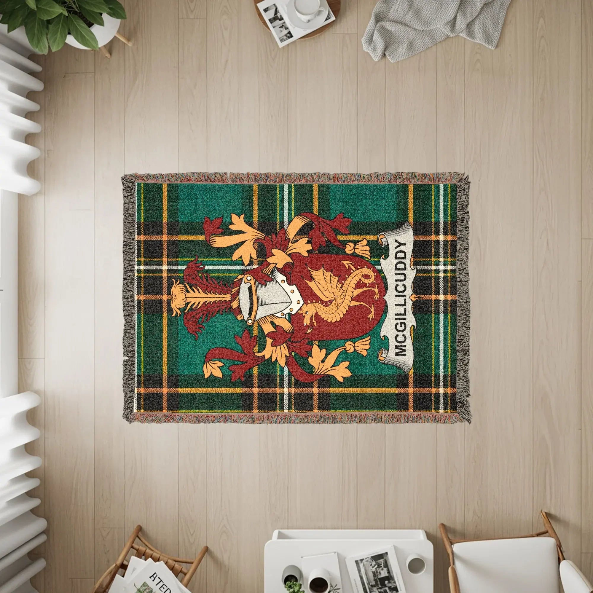 Tartan rug with McGILLICUDDY coat of arms in center.