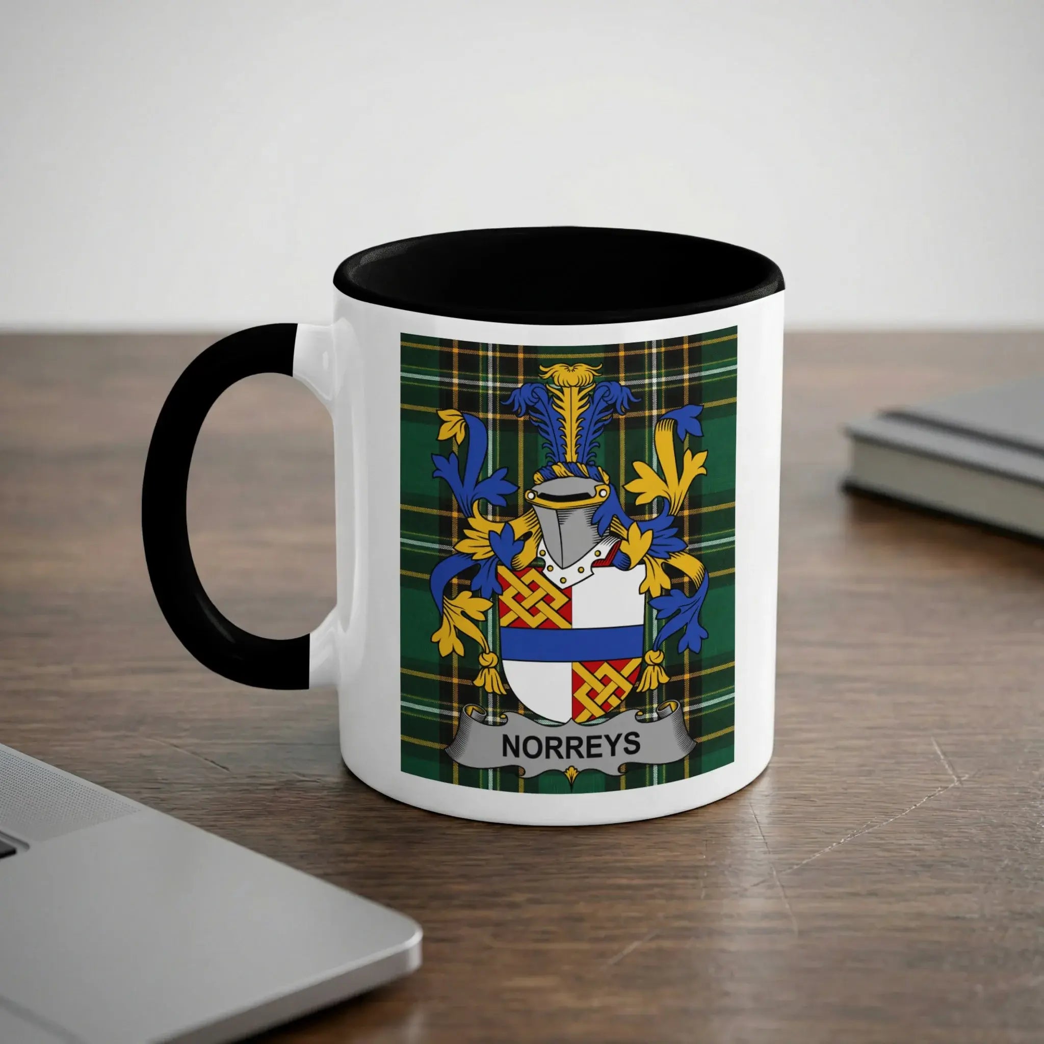 Norreys black accent mug with family crest on tartan background