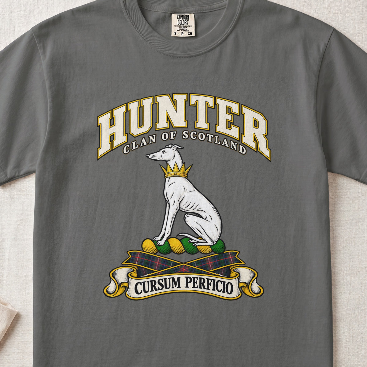 Hunter Scottish clan T-shirt in Pepper, front view with a seated white hound with a golden collar and motto banner.