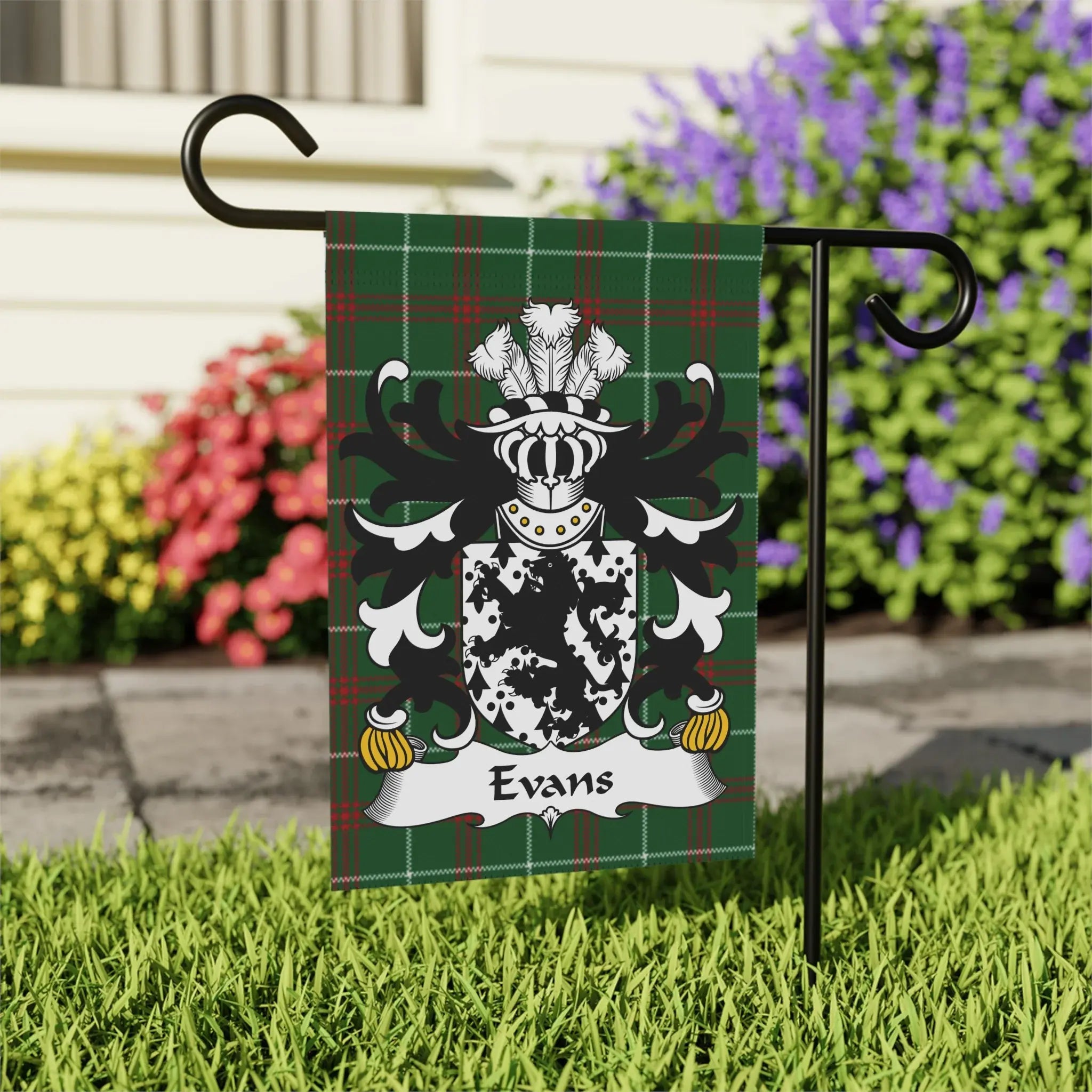 Green tartan flag with the Evans family crest displayed.