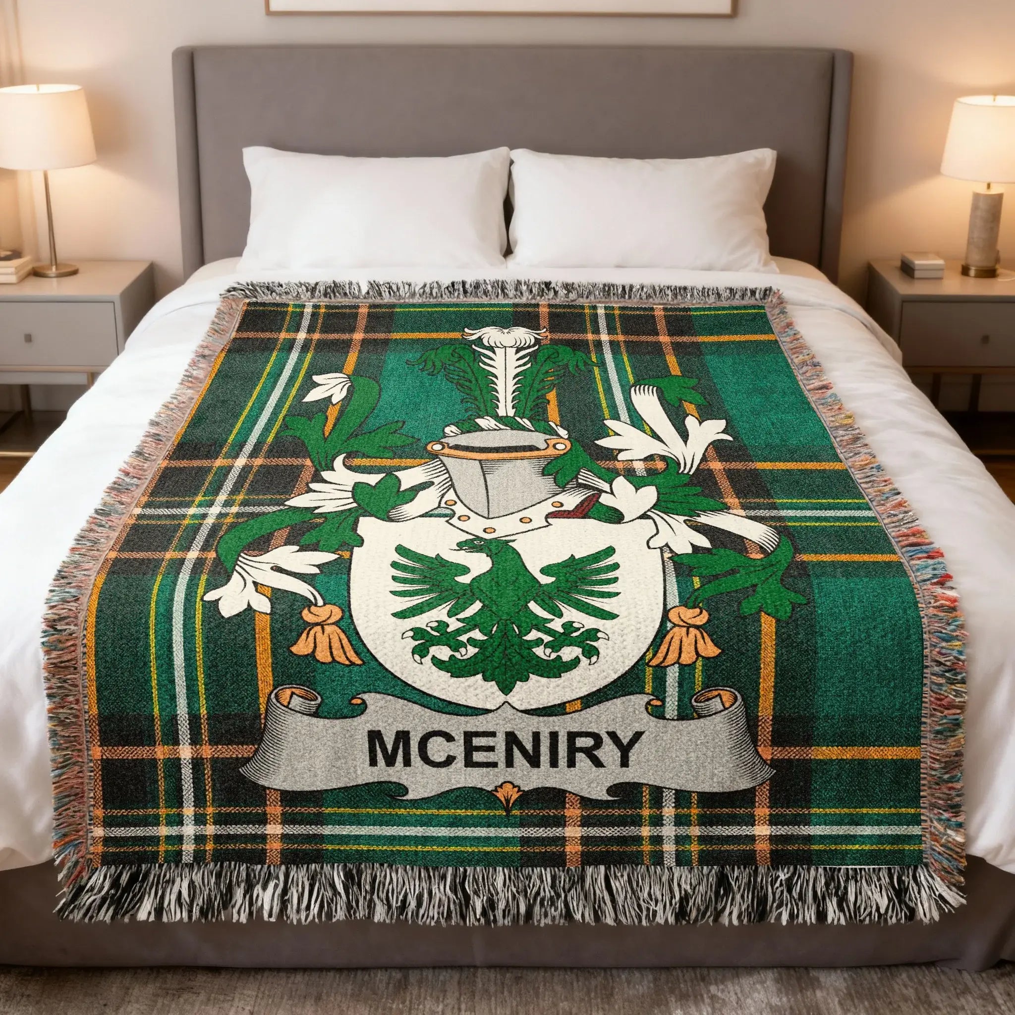 McINIRY family crest on a green plaid woven blanket on a bed.