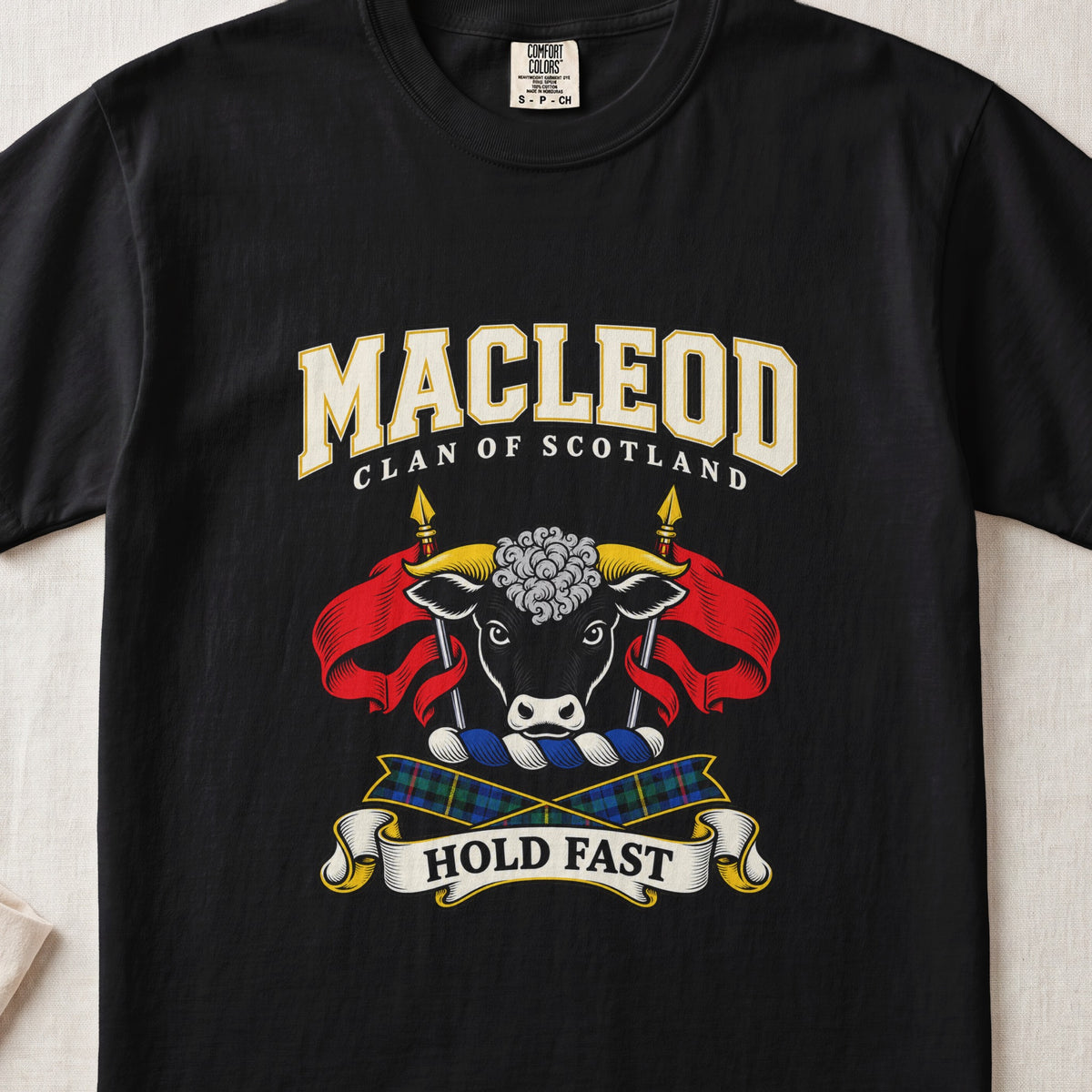 MacLeod graphic T-shirt in Black, front flat lay showing varsity lettering and black bull head with gold horns and white forehead curls.