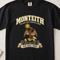 Monteith Scottish clan T-shirt in Black, front view with an eagle beneath a golden sun and motto design.