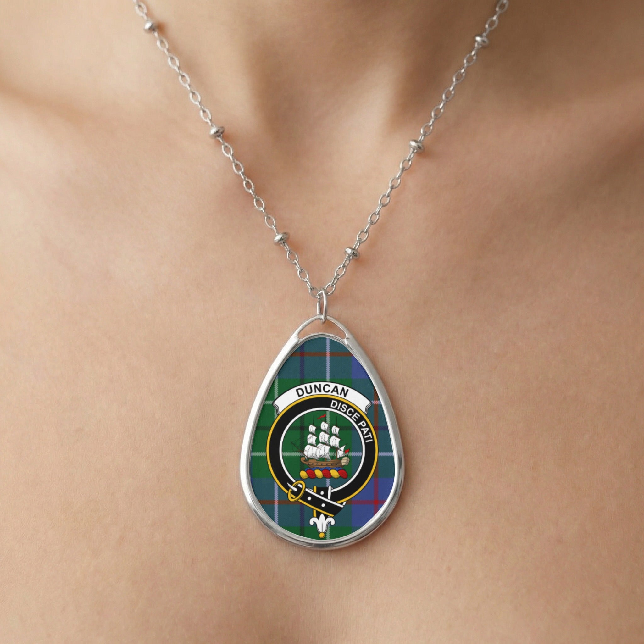 Close-up of Duncan clan tartan pendant necklace with crest design